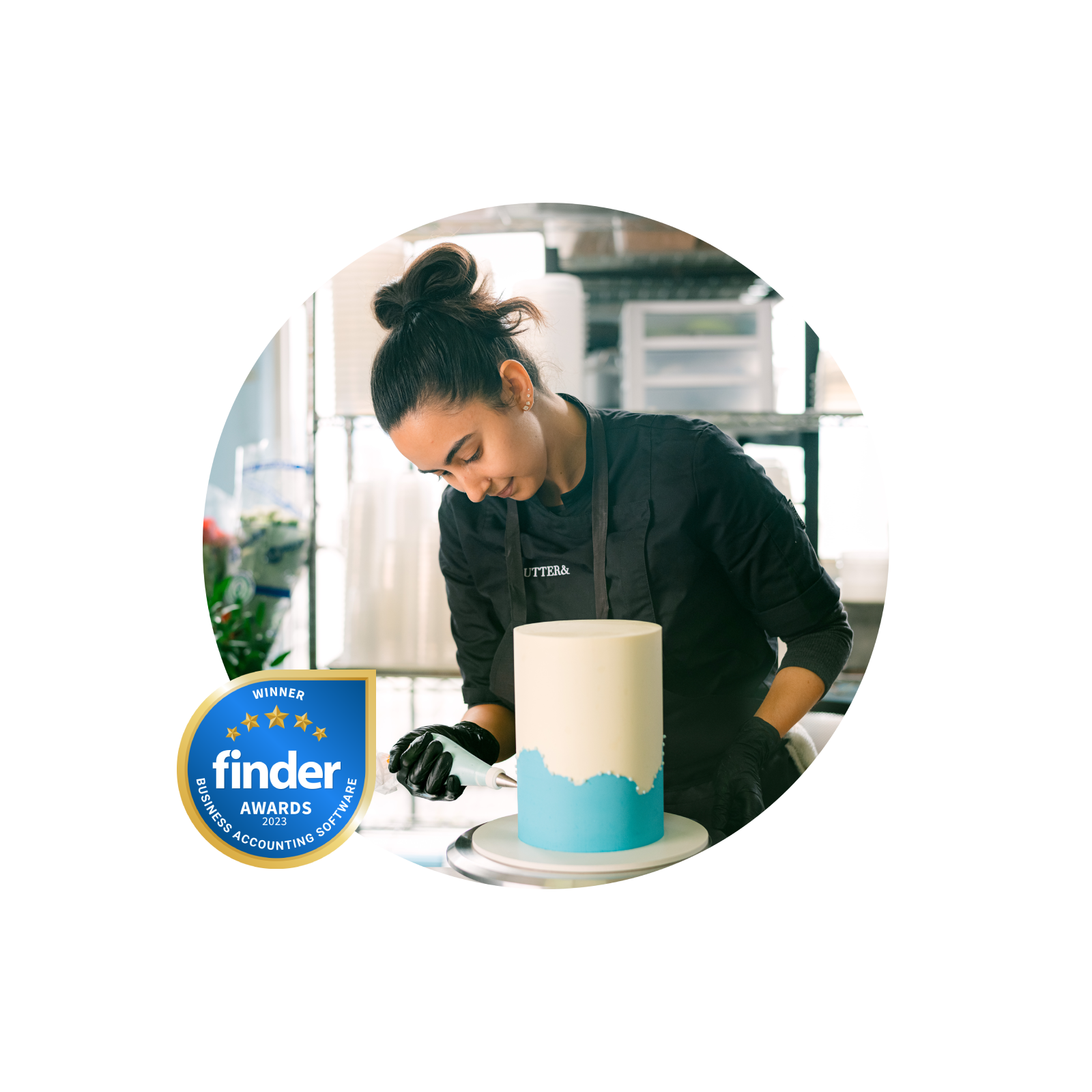 A Xero user decorating a cake with blue icing. Social proof award badge on the corner of the image.